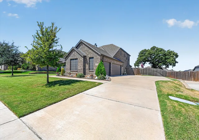 Photo 3 of Single family home for sale at 1940 Silver Fls Dr, Burleson, TX 76028 | MLS# 21376417 | Listing updated on 2026-10-02