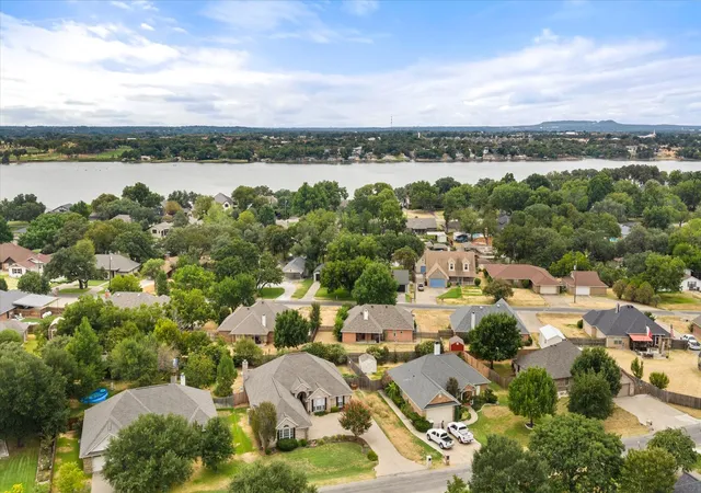 Photo 4 of Single family home for sale at 313 Casas Del Norte St, Granbury, TX 76049 | MLS# 21378329 | Listing updated on 2026-09-22