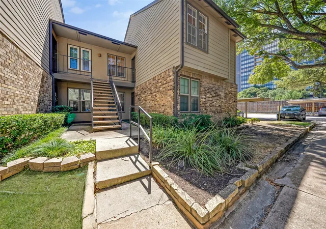 Listing Photo 1 - Condo for sale in building located at 5300 Keller Springs Rd, Dallas, TX 75248 - Unit #1077