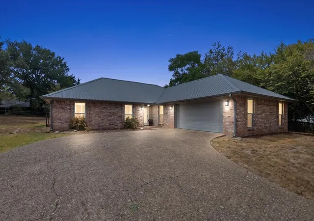 Photo 1 of Single family home for sale at 306 Lonestar Ln, Hideaway, TX 75771 | MLS# 21379590 | Listing updated on 2026-09-28