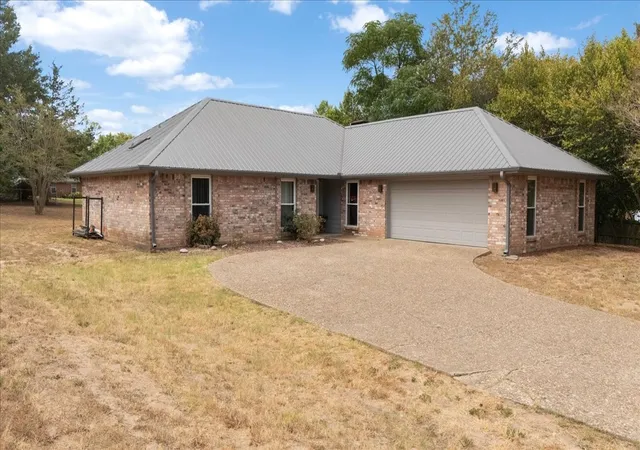 Photo 2 of Single family home for sale at 306 Lonestar Ln, Hideaway, TX 75771 | MLS# 21379590 | Listing updated on 2026-09-28