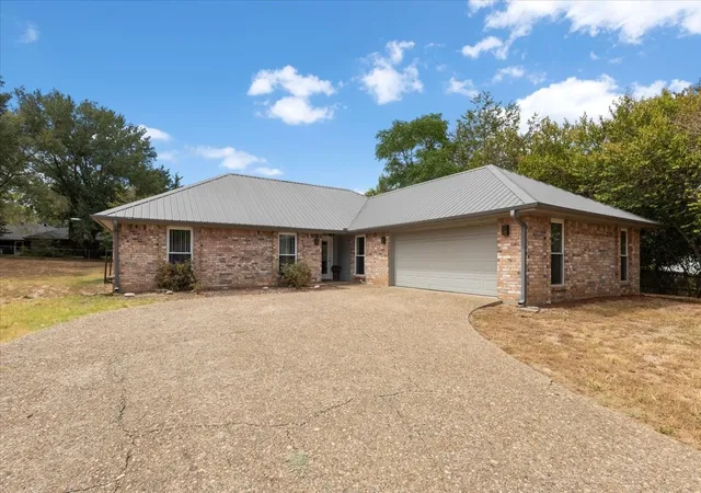Photo 3 of Single family home for sale at 306 Lonestar Ln, Hideaway, TX 75771 | MLS# 21379590 | Listing updated on 2026-09-28