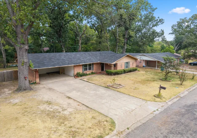 Photo 2 of Sale Pending at 405 Redbud Ln, Mount Pleasant, TX 75455 | MLS# 21376821 | Listing updated on 2026-09-23
