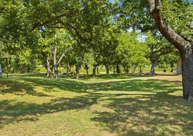 Photo 2 of Single family home for sale at 8704 Frontier Ct, Granbury, TX 76048 | MLS# 21382660 | Listing updated on 2026-09-19