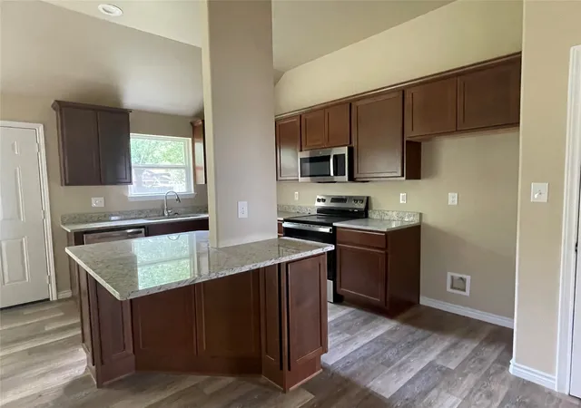 Photo 3 of Single family home for sale at 721 Hillburn, Quinlan, TX 75474 | MLS# 21372107 | Listing updated on 2026-09-15