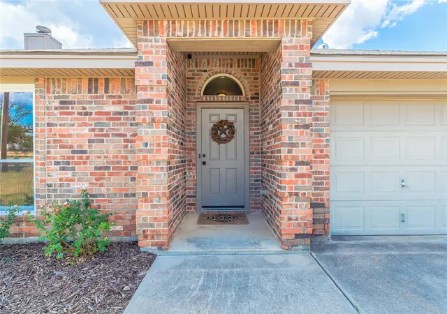 Photo 2 of Single family home for sale at 521 N Avenue E, Springtown, TX 76082 | MLS# 21384281 | Listing updated on 2026-10-08