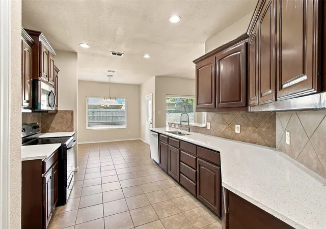 Photo 3 of Single family home for sale at 11808 Anna Grace Dr, Burleson, TX 76028 | MLS# 21384949 | Listing updated on 2026-09-16