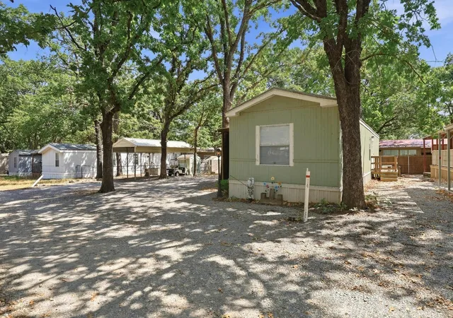 Photo 1 of Manufactured home for sale at 14 Bravo Rd, Pottsboro, TX 75076 | MLS# 21384306 | Listing updated on 2026-10-07
