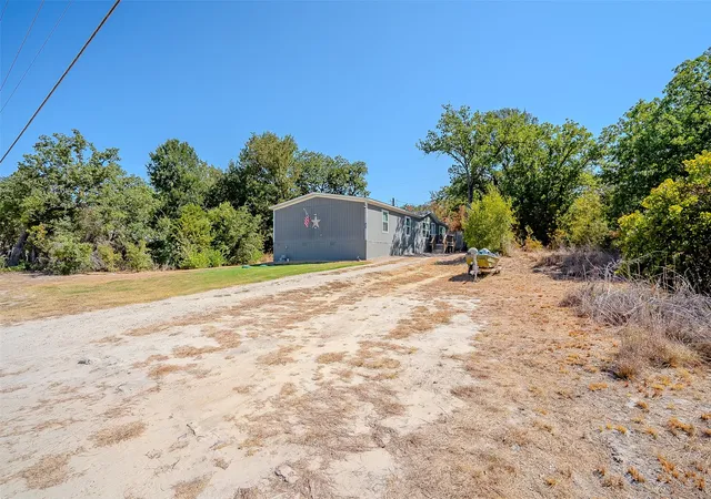 Photo 2 of Manufactured home for sale at 5913 N Oklahoma Trl, Granbury, TX 76048 | MLS# 21386954 | Listing updated on 2026-09-15