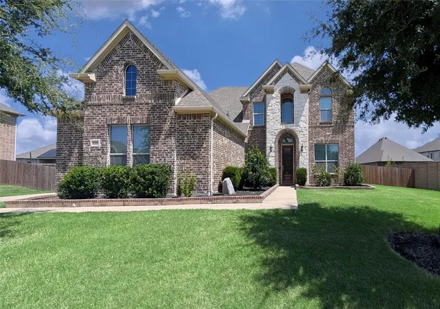 Photo 1 of Single family home for sale at 5205 Shelter Point Ct, Mansfield, TX 76063 | MLS# 21387458 | Listing updated on 2026-10-09