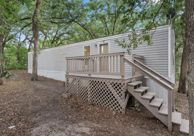 Photo 1 of Manufactured home for sale at 210 Ben Lacy Dr, Gun Barrel City, TX 75156 | MLS# 21387924 | Listing updated on 2026-09-17