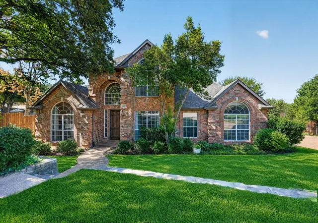 Photo 1 of Single family home for sale at 2830 Woodhollow Ct, Lewisville, TX 75077 | MLS# 21382145 | Listing updated on 2026-10-08