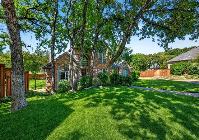 Photo 2 of Single family home for sale at 2830 Woodhollow Ct, Lewisville, TX 75077 | MLS# 21382145 | Listing updated on 2026-10-08