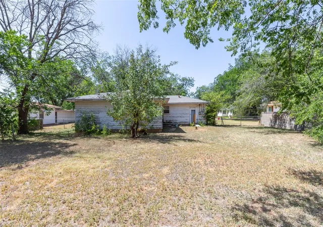Photo 2 of Single family home for sale at 1404 Herring, Merkel, TX 79536 | MLS# 21388600 | Listing updated on 2026-09-17