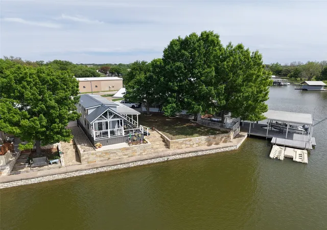 Photo 1 of Single family home for sale at 817 Brazos Harbor Cir, Granbury, TX 76048 | MLS# 21387726 | Listing updated on 2026-10-04