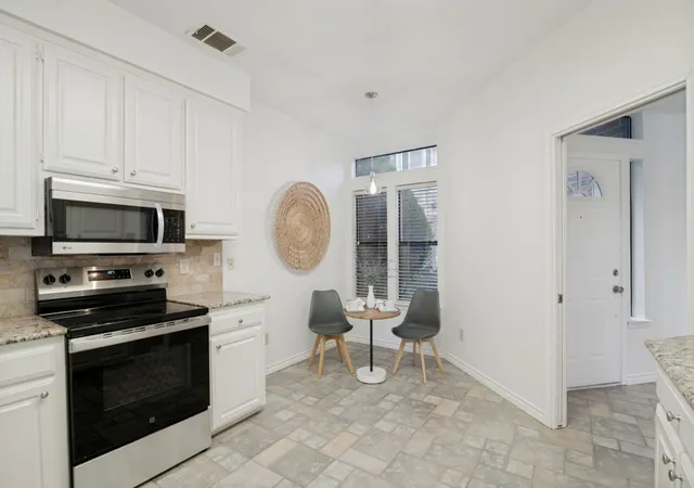 Listing Photo 4 - Condo for sale in building located at 9961 Waterfront Trl, Rowlett, TX 75087 - Unit #9961