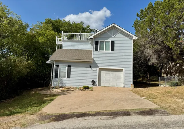 Photo 1 of Single family home for sale at 1712 Smokehouse Rd, Granbury, TX 76049 | MLS# 21389656 | Listing updated on 2026-10-09