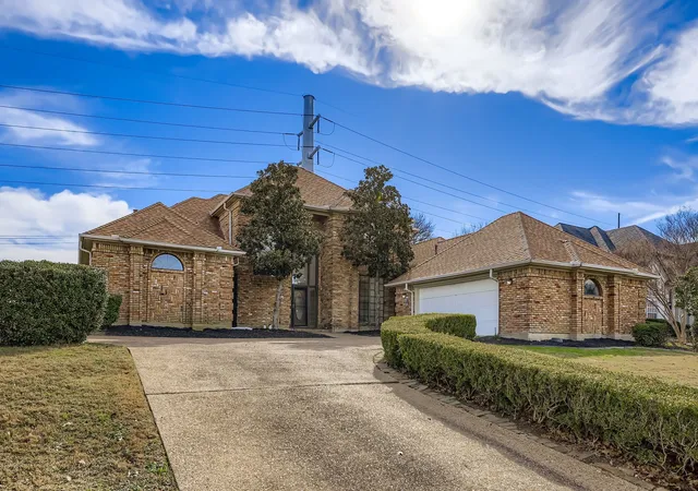 Photo 2 of Single family home for sale at 2210 Club Crk Cir, Garland, TX 75043 | MLS# 21389303 | Listing updated on 2026-10-08