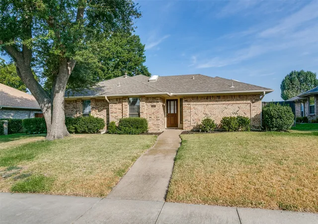 Photo 1 of Single family home for sale at 1927 E Branch Holw Dr, Carrollton, TX 75007 | MLS# 21389717 | Listing updated on 2026-09-26
