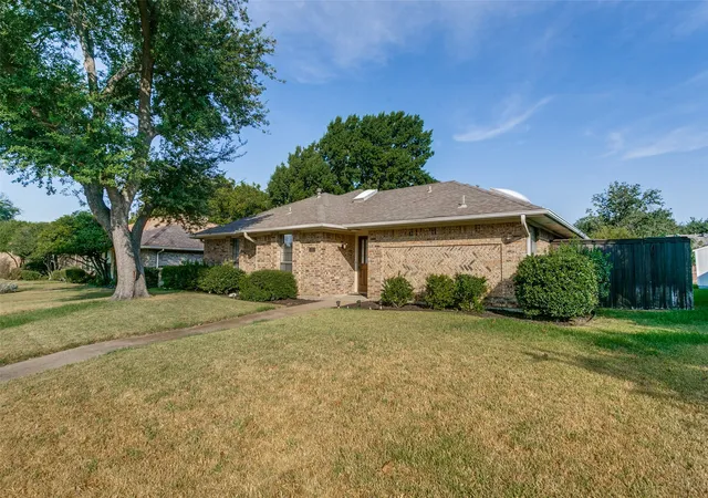Photo 2 of Single family home for sale at 1927 E Branch Holw Dr, Carrollton, TX 75007 | MLS# 21389717 | Listing updated on 2026-09-26