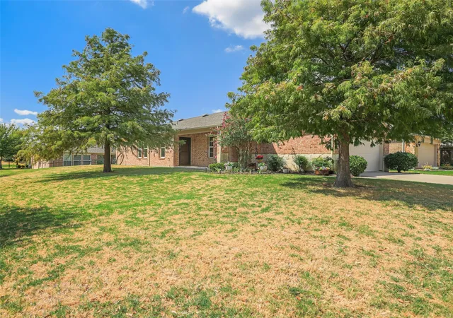 Photo 2 of Single family home for sale at 7409 Kite Ln, Frisco, TX 75036 | MLS# 21388082 | Listing updated on 2026-09-21
