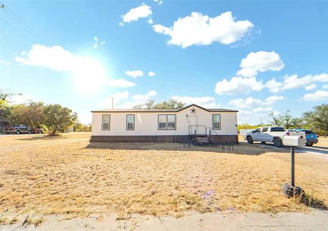 Photo 2 of Manufactured home for sale at 915 S Miller St, Breckenridge, TX 76424 | MLS# 21390844 | Listing updated on 2026-09-20