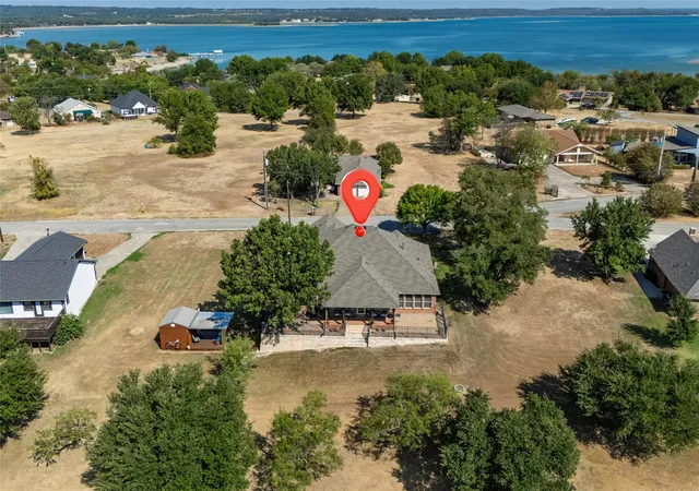 Photo 2 of Single family home for sale at 115 Lakeview Dr, Runaway Bay, TX 76426 | MLS# 21391232 | Listing updated on 2026-09-21