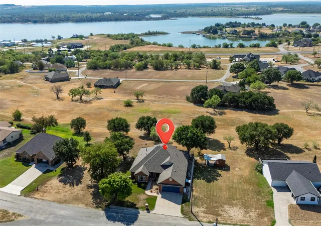 Photo 3 of Single family home for sale at 115 Lakeview Dr, Runaway Bay, TX 76426 | MLS# 21391232 | Listing updated on 2026-09-21