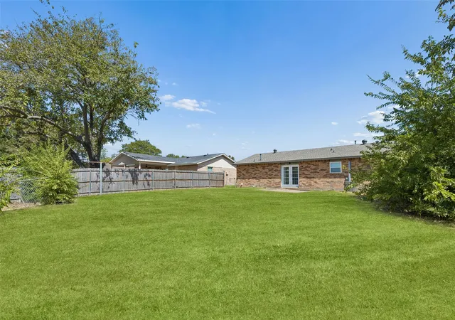 Photo 2 of Single family home for sale at 910 Quebec Dr, Garland, TX 75040 | MLS# 21390641 | Listing updated on 2026-10-03