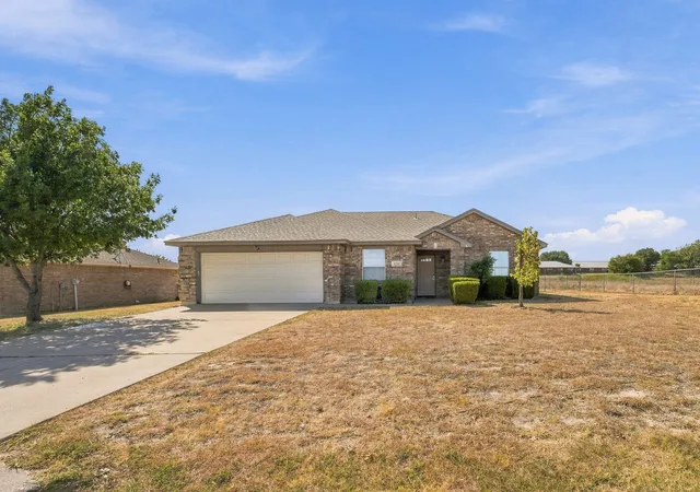 Photo 2 of Single family home for sale at 1711 Chenoweth St, Decatur, TX 76234 | MLS# 21388749 | Listing updated on 2026-09-22