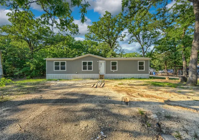 Photo 1 of Manufactured home for sale at 1808 Grady Rd, Quinlan, TX 75474 | MLS# 21389829 | Listing updated on 2026-09-22