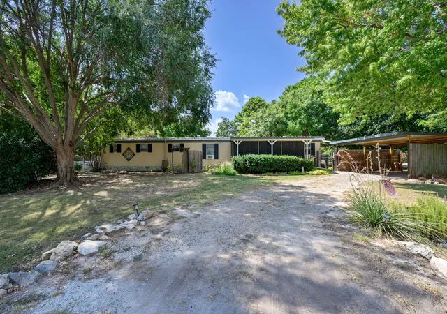 Photo 1 of Manufactured home for sale at 1709 E Apache Trl, Granbury, TX 76048 | MLS# 21389888 | Listing updated on 2026-09-28