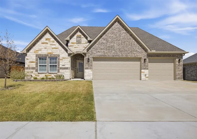 Photo 1 of Single family home for sale at 215 Trevor Ln, Greenville, TX 75402 | MLS# 21393345 | Listing updated on 2026-10-09