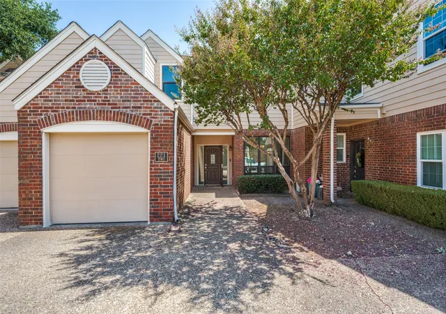Photo 1 of Condo for sale at 221 Cimarron Trl #2, Irving, TX 75063 | MLS# 21363962 | Listing updated on 2026-09-24