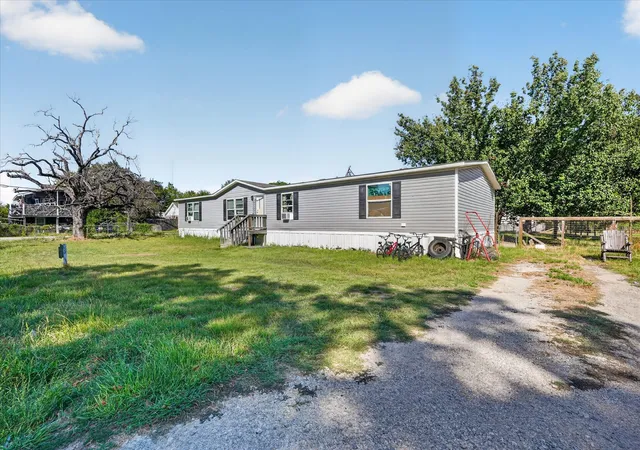 Photo 2 of Manufactured home for sale at 9313 Robin, Quinlan, TX 75474 | MLS# 21389762 | Listing updated on 2026-10-07