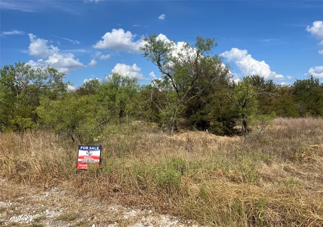 Photo 1 of Land for sale at Lot 65 Blk 7 Ringo Ct, Runaway Bay, TX 76426 | MLS# 21394370 | Listing updated on 2026-09-24