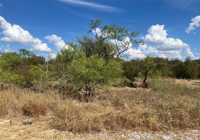 Photo 2 of Land for sale at Lot 65 Blk 7 Ringo Ct, Runaway Bay, TX 76426 | MLS# 21394370 | Listing updated on 2026-09-24