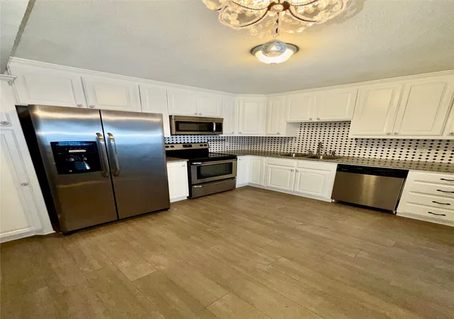 Photo 3 of Condo for sale at 7855 Meadow Park Dr #B, Dallas, TX 75230 | MLS# 21392487 | Listing updated on 2026-09-25