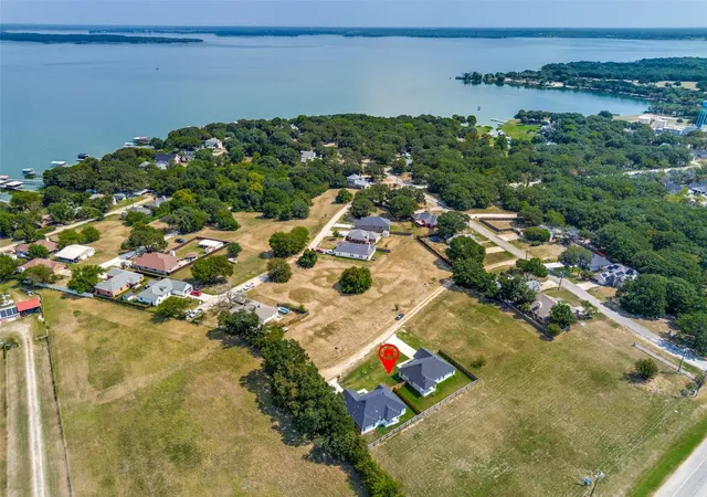 Photo 1 of Single family home for sale at 705 Lakeland Dr, Quinlan, TX 75474 | MLS# 21395599 | Listing updated on 2026-09-25