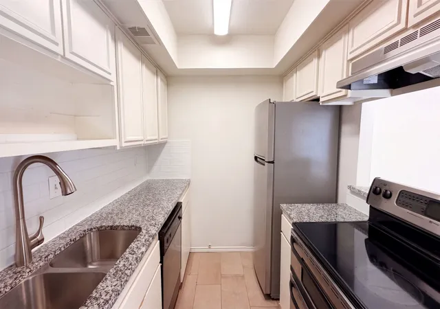 Photo 2 of Townhouse for sale at 709 Baruna Cir, Garland, TX 75043 | MLS# 21395916 | Listing updated on 2026-10-09