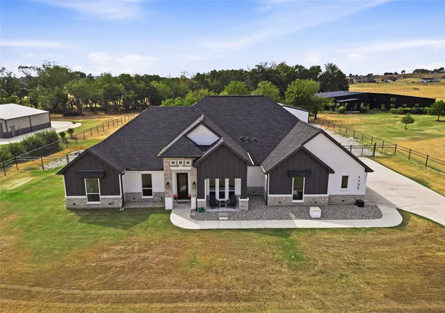 Photo 1 of Single family home for sale at 1135 Paradise Pkwy, Poolville, TX 76487 | MLS# 21396054 | Listing updated on 2026-10-10