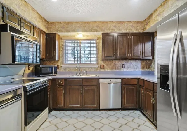 Photo 2 of Sale Pending at 12502 Burninglog Ln, Dallas, TX 75243 | MLS# 21360859 | Listing updated on 2026-10-04