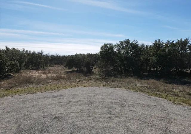 Photo 1 of Land for sale at Tbd Lot 490 Sandcastle Dr, Brownwood, TX 76801 | MLS# 21396691 | Listing updated on 2026-09-26