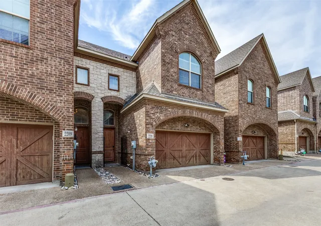 Photo 1 of Townhouse for sale at 2211 Eriksson Ln, Dallas, TX 75204 | MLS# 21396970 | Listing updated on 2026-09-27