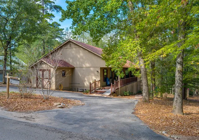 Photo 2 of Single family home for sale at 705 Wildwood Trl, Holly Lake Ranch, TX 75765 | MLS# 21397026 | Listing updated on 2026-10-08