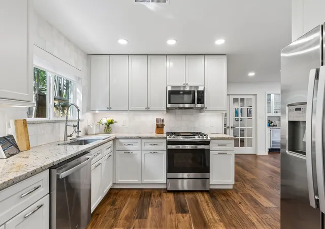 Photo 4 of Single family home for sale at 412 Ridgewood Dr, Richardson, TX 75080 | MLS# 21394611 | Listing updated on 2026-10-04
