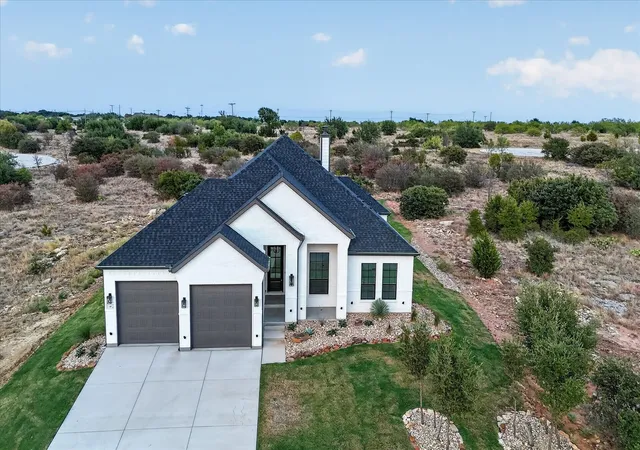 Photo 1 of Single family home for sale at 60 Heritage Dr, Possum Kingdom Lake, TX 76449 | MLS# 21389601 | Listing updated on 2026-09-29