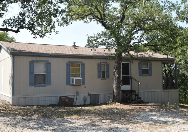 Photo 1 of Manufactured home for sale at 214 Cactus Ln, Gordon, TX 76453 | MLS# 21398481 | Listing updated on 2026-09-30