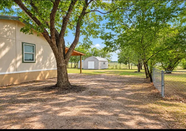 Photo 3 of Manufactured home for sale at 105 E Laura Ave, Quinlan, TX 75474 | MLS# 21397340 | Listing updated on 2026-09-30