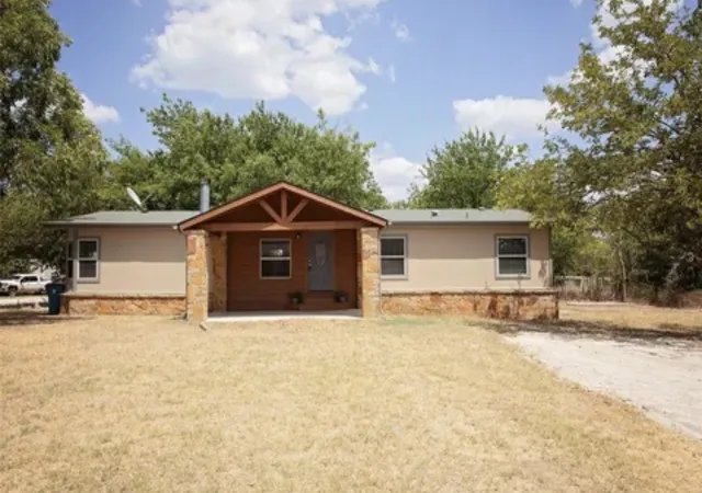 Photo 1 of Manufactured home for sale at 128 Burkhalter St, Graford, TX 76449 | MLS# 21398684 | Listing updated on 2026-10-01